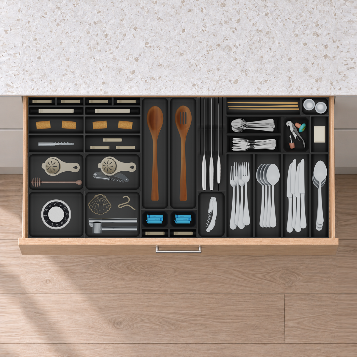 Compact Wide Cutlery & Knives Drawer Organiser Set in Charcoal Black, fitted in an oak drawer under neutral white light. Nominal layout 944 × 442.5 mm. Accessories shown are not included.