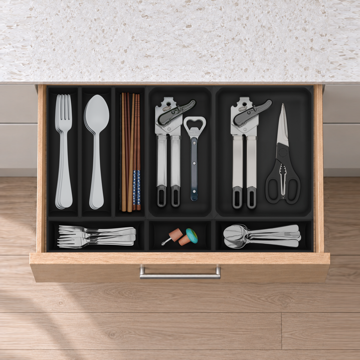 Cutlery & Kitchen Tools Drawer Organiser Set in Charcoal Black, fitted in an oak drawer under neutral white light. Nominal layout 295 × 472 mm. Accessories shown are not included.