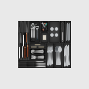 Charcoal Black dual knife and cutlery drawer organiser set; 14 modules, nominal footprint 501.5 × 560.5 mm; utensils are illustrative and not included.