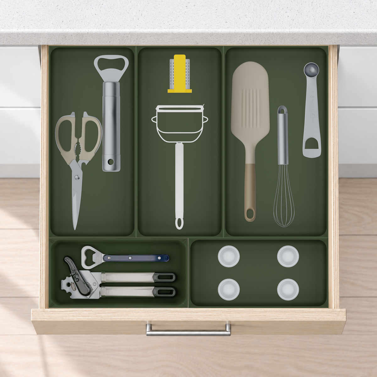 Essentialist Kitchen Tool Drawer Organiser Set – 442.5 × 472 mm in Olive Green, fitted wall-to-wall in an illustrative pale birch plywood drawer under neutral white light. Accessories shown for illustration.