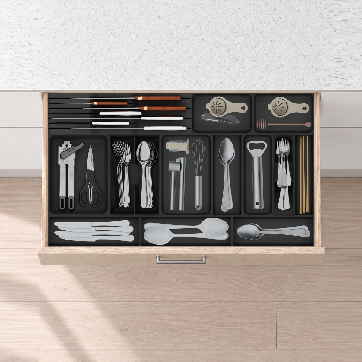 Wide Cutlery, Chef Knives & Kitchen Tools Drawer Organiser Set – 767 × 442.5 mm in Charcoal Black, fitted wall-to-wall in an illustrative pale birch plywood drawer under neutral white light. Accessories shown for illustration.