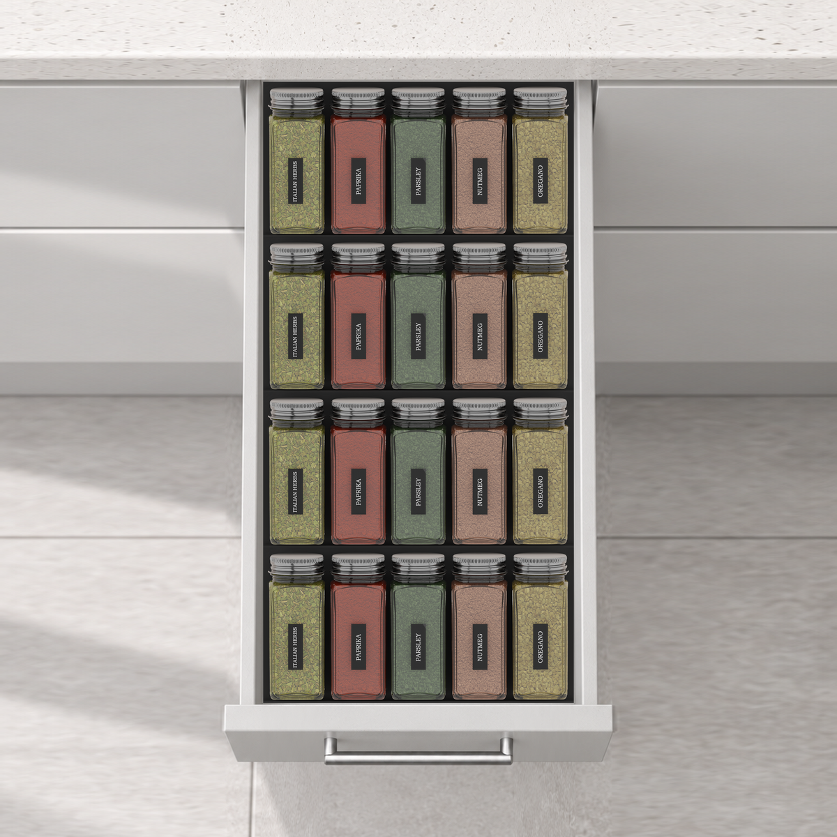 Four-Row Spice Drawer Organiser Set – 472 × 236 mm in Charcoal Black, fitted wall-to-wall in an illustrative matte light-grey drawer under neutral white light. Accessories shown for illustration.