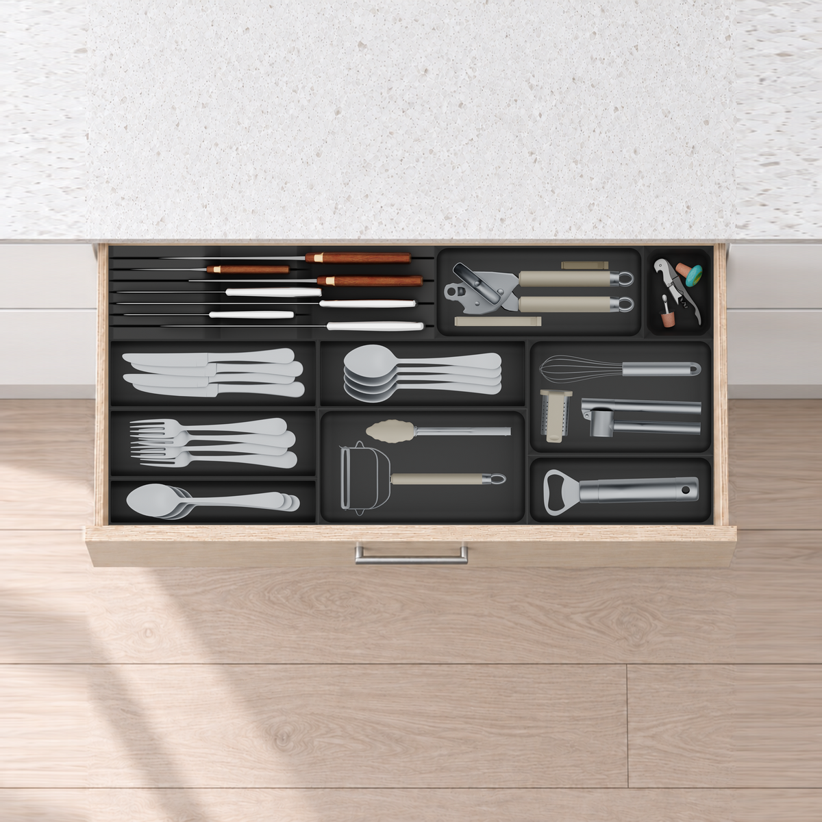 Shallow Wide Cutlery & Knife Drawer Organiser Set – 767 × 354 mm in Charcoal Black, fitted wall-to-wall in an illustrative pale birch plywood drawer under neutral white light. Accessories shown for illustration.