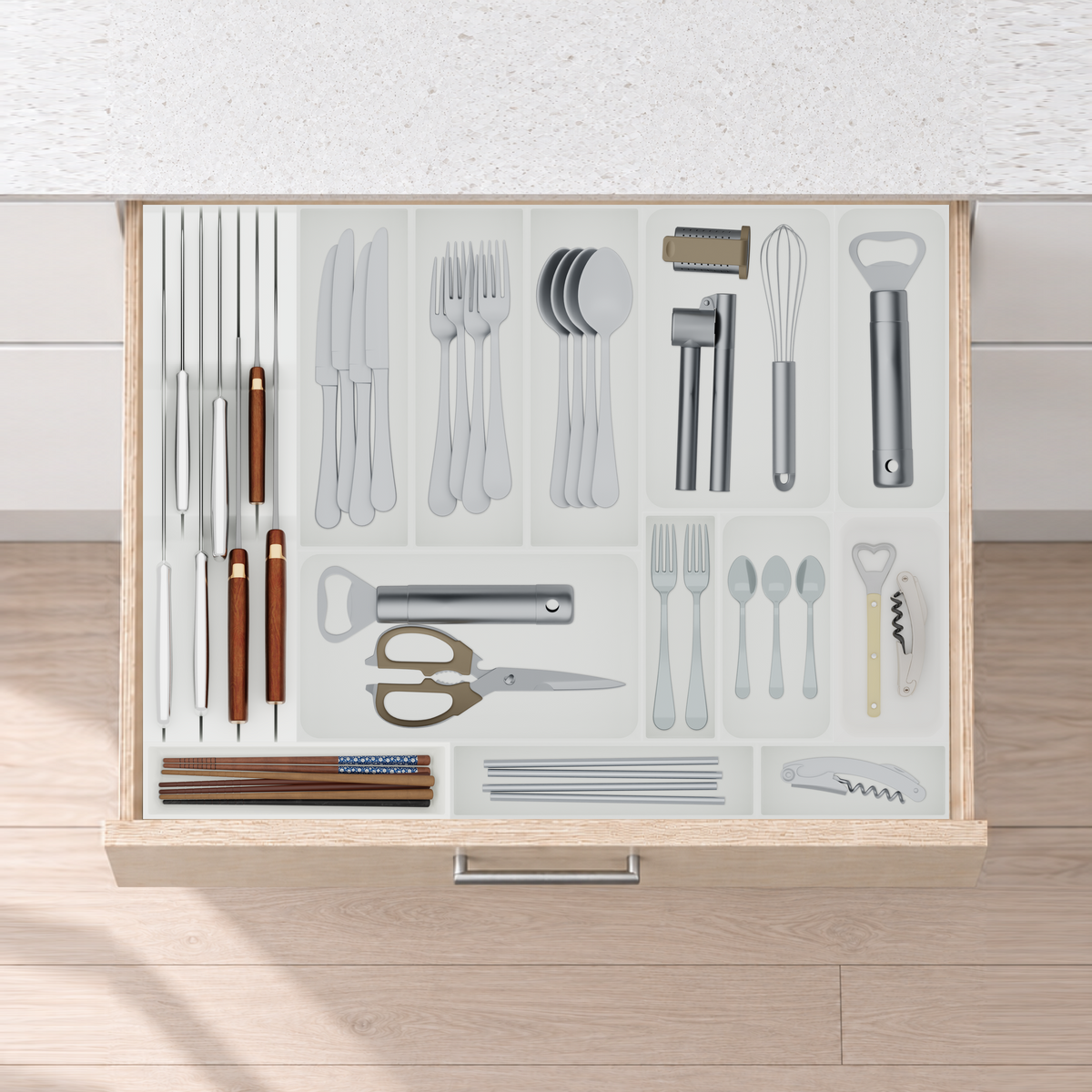 Wide Cutlery & Chef Knife Drawer Organiser Set – 619.5 × 472 mm in Cotton White, fitted wall-to-wall in an illustrative pale birch plywood drawer under neutral white light. Accessories shown for illustration.