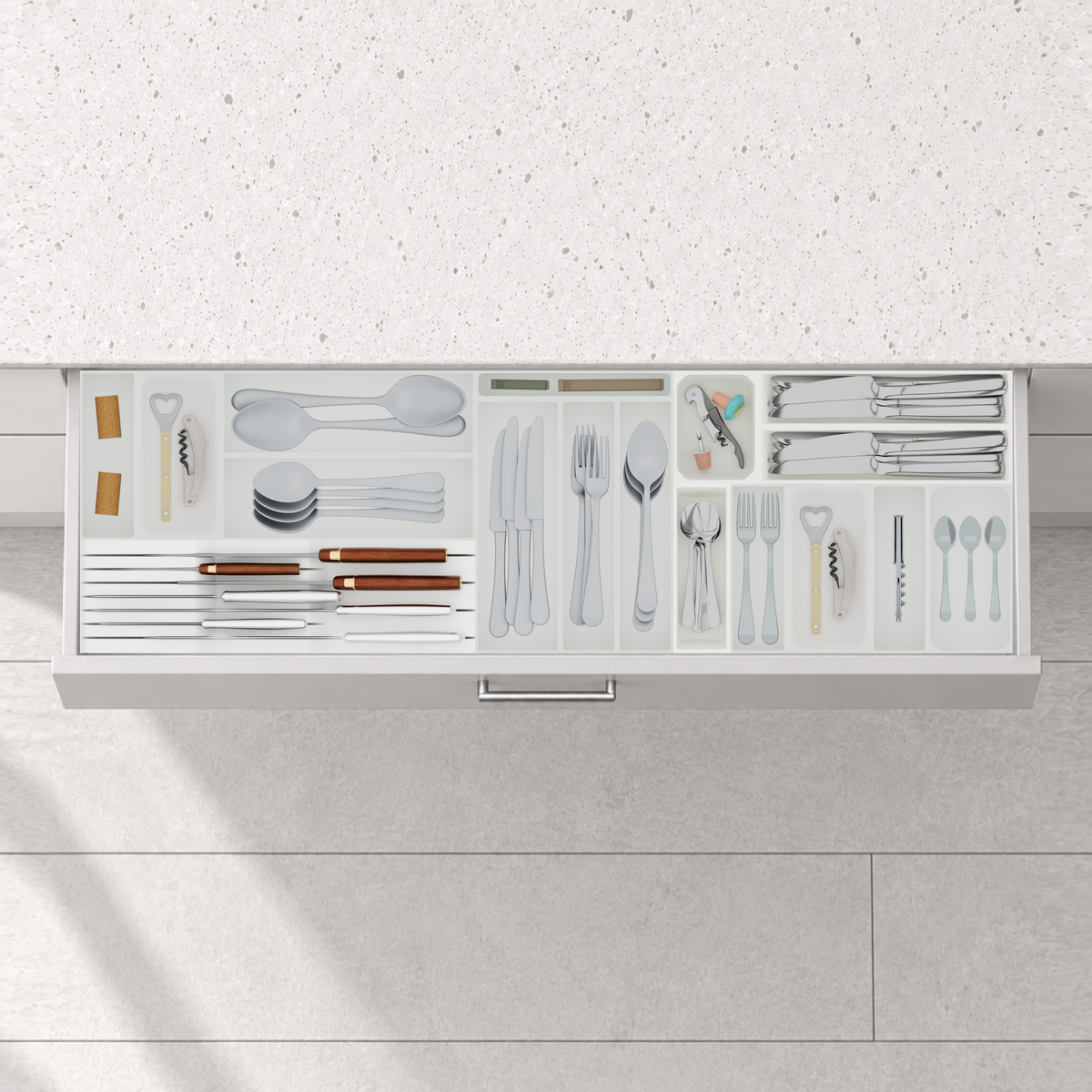 Shallow One-Metre Cutlery & Chef Knife Drawer Organiser Set – 973.5 × 295 mm in Cotton White, fitted wall-to-wall in an illustrative matte light-grey drawer under neutral white light. Accessories shown for illustration.