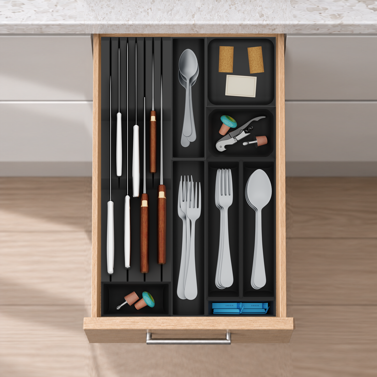 Slim Modular Cutlery & Knife Organiser – 472x295mm in Charcoal Black, fitted wall-to-wall in an illustrative natural oak drawer under neutral white light. Accessories shown for illustration.
