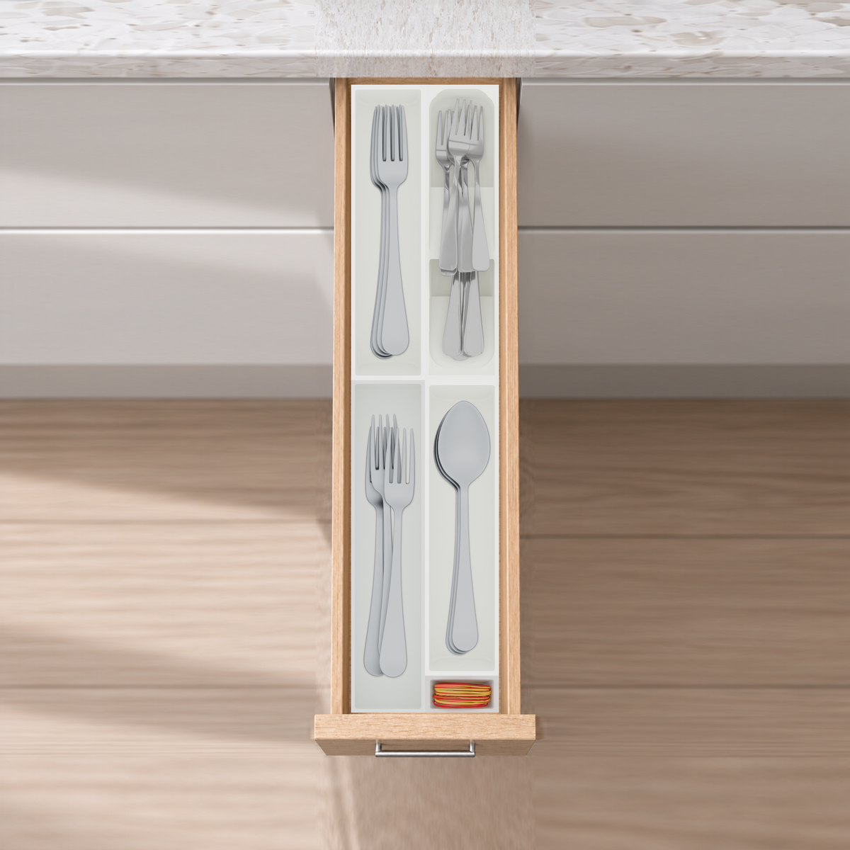 Narrow Core Cutlery Organiser – 501.5x118mm in Cotton White, fitted wall-to-wall in an illustrative natural oak drawer under neutral white light. Accessories shown for illustration.