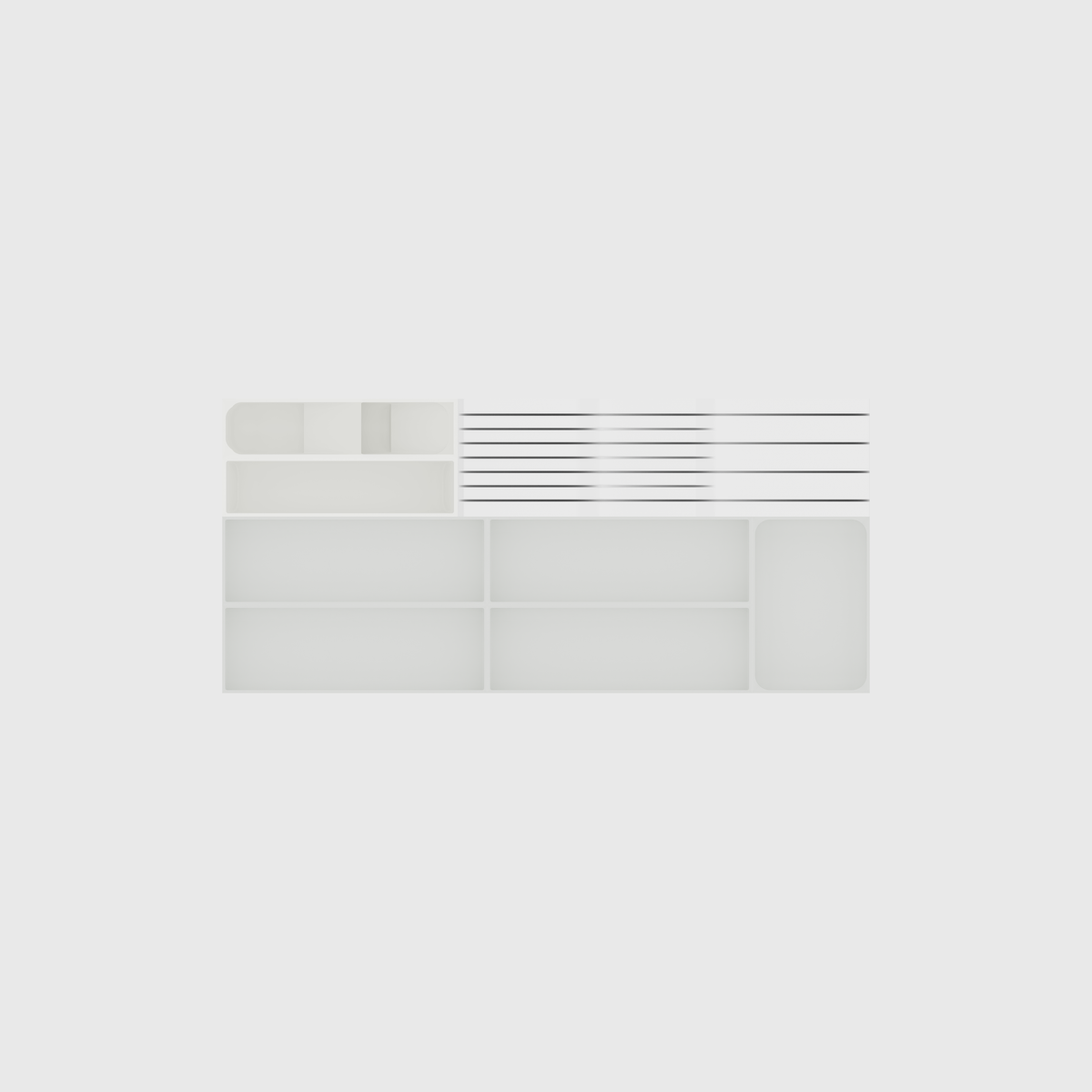 Empty eight-module shallow wide cutlery and chef knives drawer organiser set in Cotton White; nominal 649 × 295 mm grid footprint
