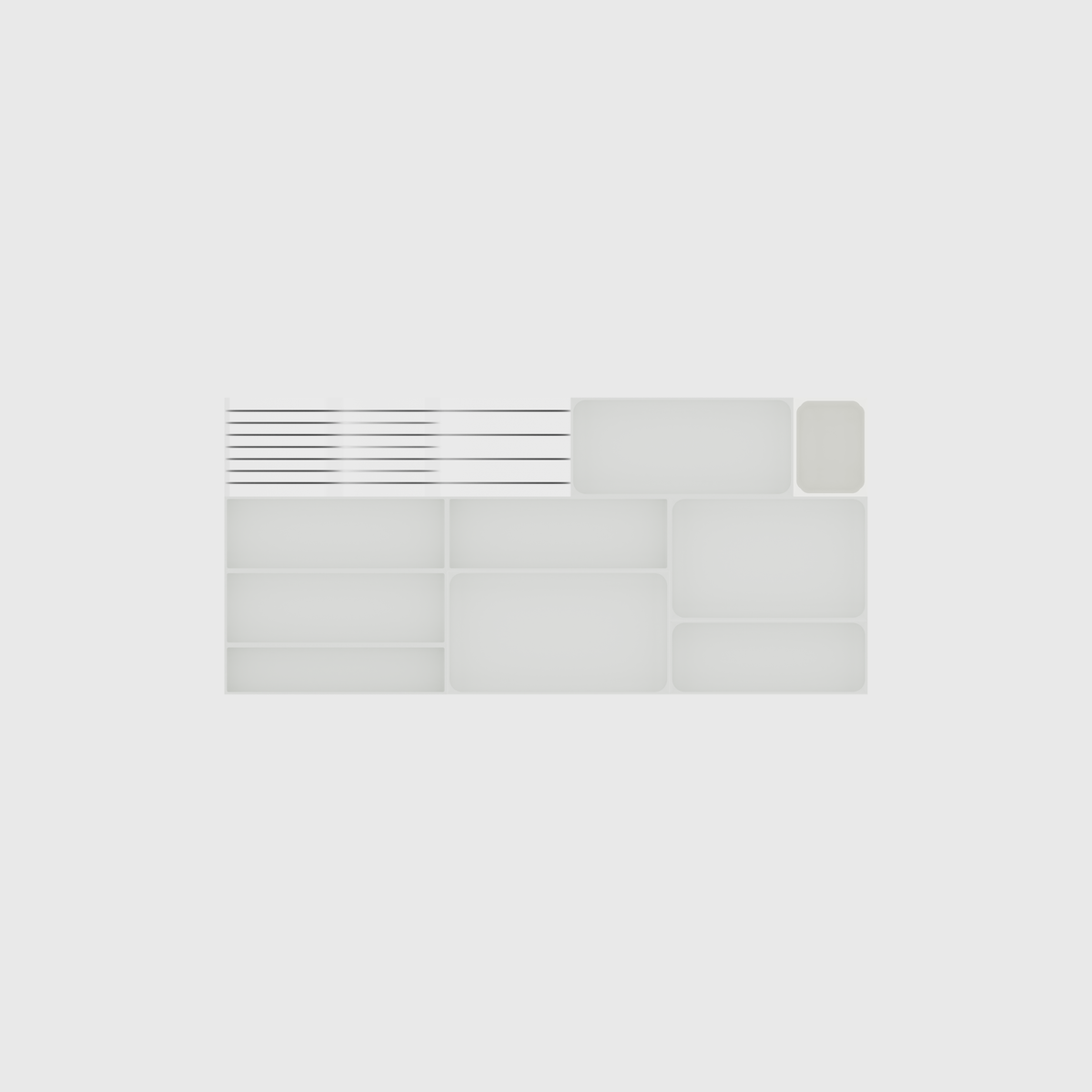 Empty module layout of the wide shallow cutlery and knife set in Cotton White; nominal 767 × 354 mm grid footprint.