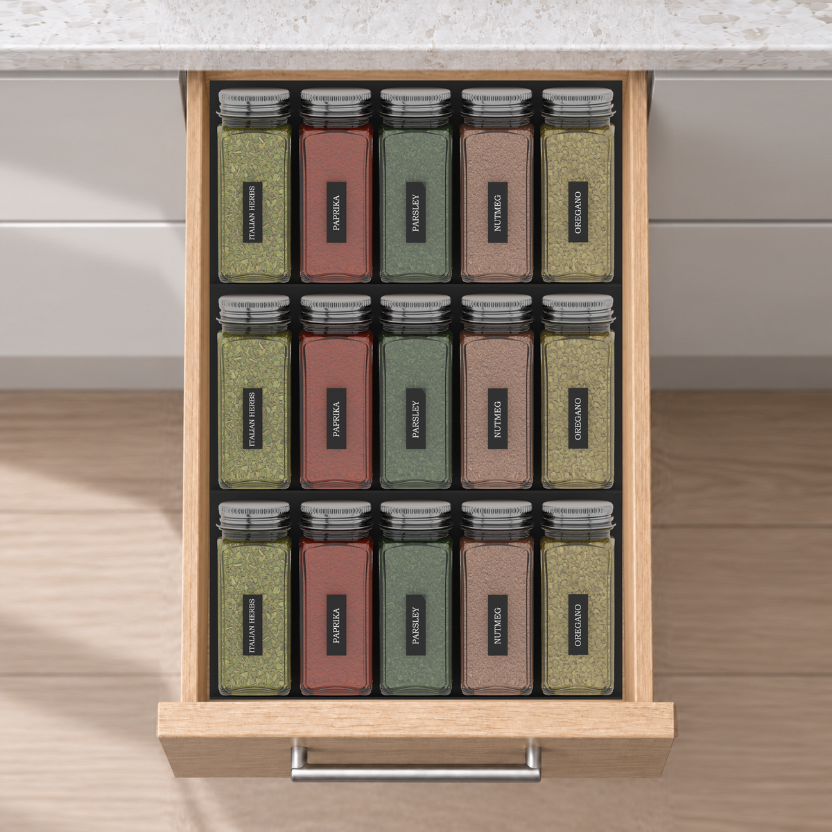 Three-Row Spice Drawer Organiser Set in Charcoal Black, fitted in an oak drawer under neutral white light. Nominal layout 354 × 236 mm. Accessories shown are not included.
