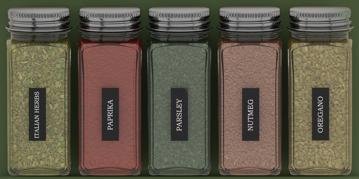 Spice Jar Organiser in Olive Green — 4×8 modular drawer organiser, food-safe PLA bioplastic, shown placed in a kitchen drawer layout