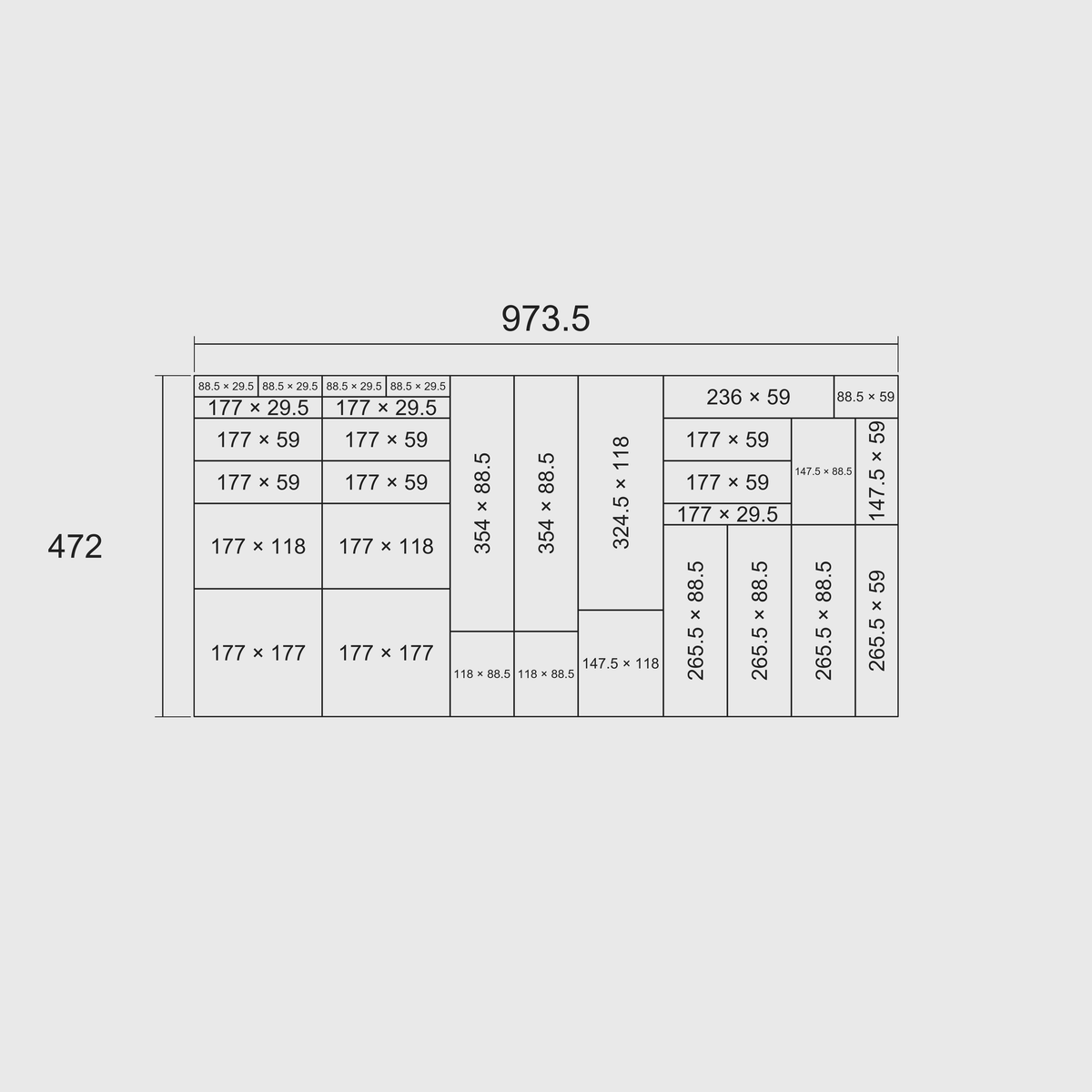 Nominal grid-footprint diagram for Wide Cutlery & Kitchen Tools: overall 973.5 mm width × 472 mm length, with each whole module’s length × width in millimetres on the 29.5 mm grid.
