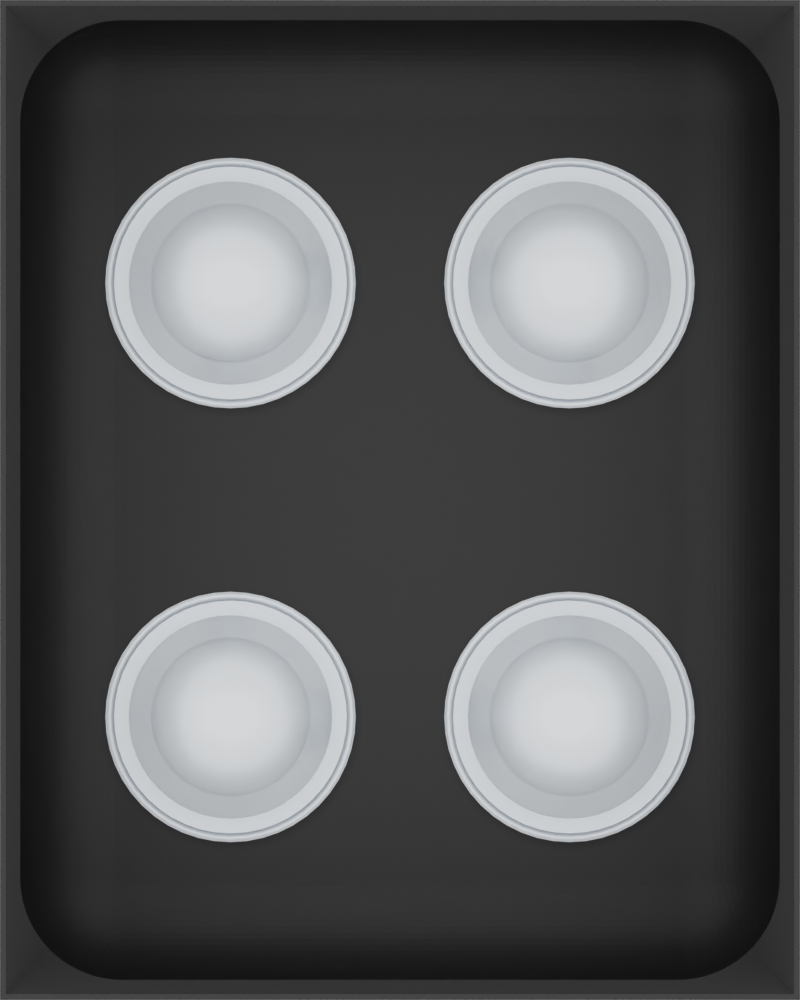 Charcoal Black stock tray with four unbranded coffee capsules