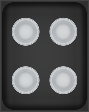 Charcoal Black stock tray with four unbranded coffee capsules