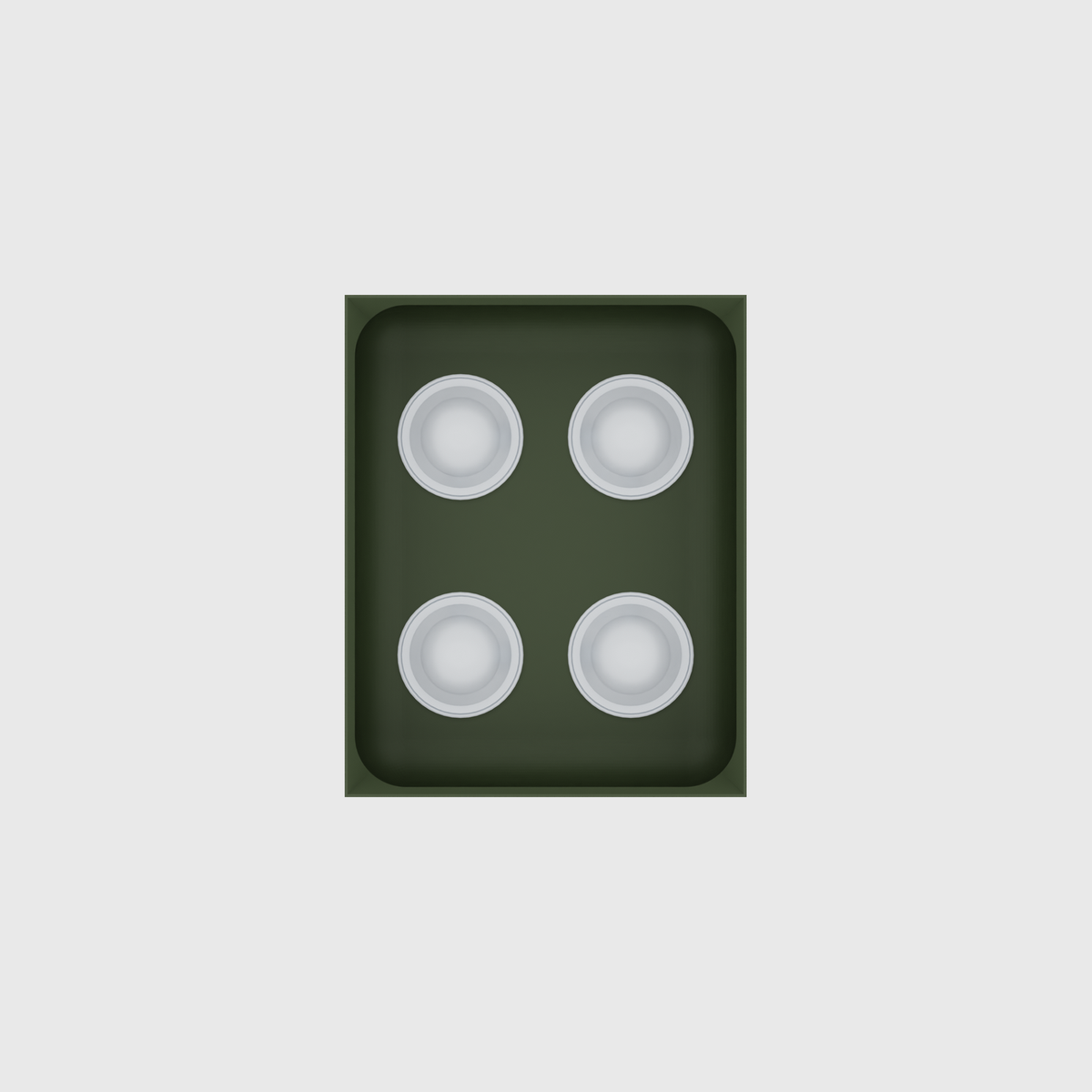 Olive Green stock tray with four unbranded coffee capsules