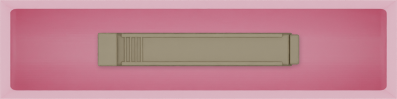 Micro strip organiser – 1×4 (29.5 × 118 mm) in Sakura Pink, shown with a sealing clip. Top view.