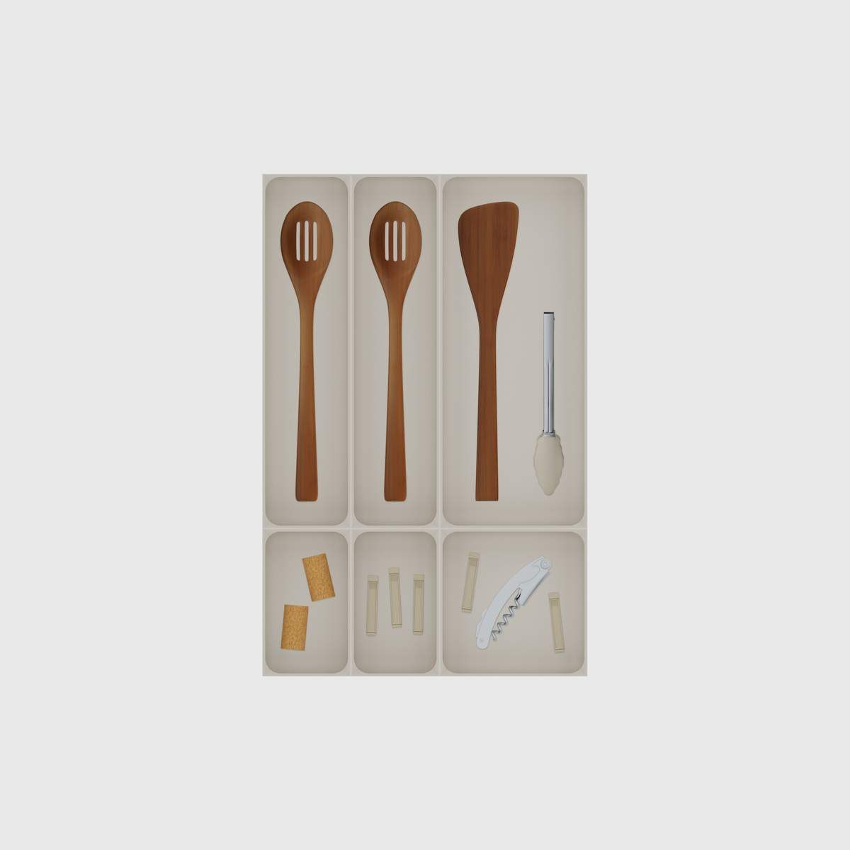 Kitchen Tool Drawer Organiser Set – 501.5 × 324.5 mm in Muted White, shown with a slotted cooking spoon, a turner and kitchen tongs, wine corks and other small items. Top view.