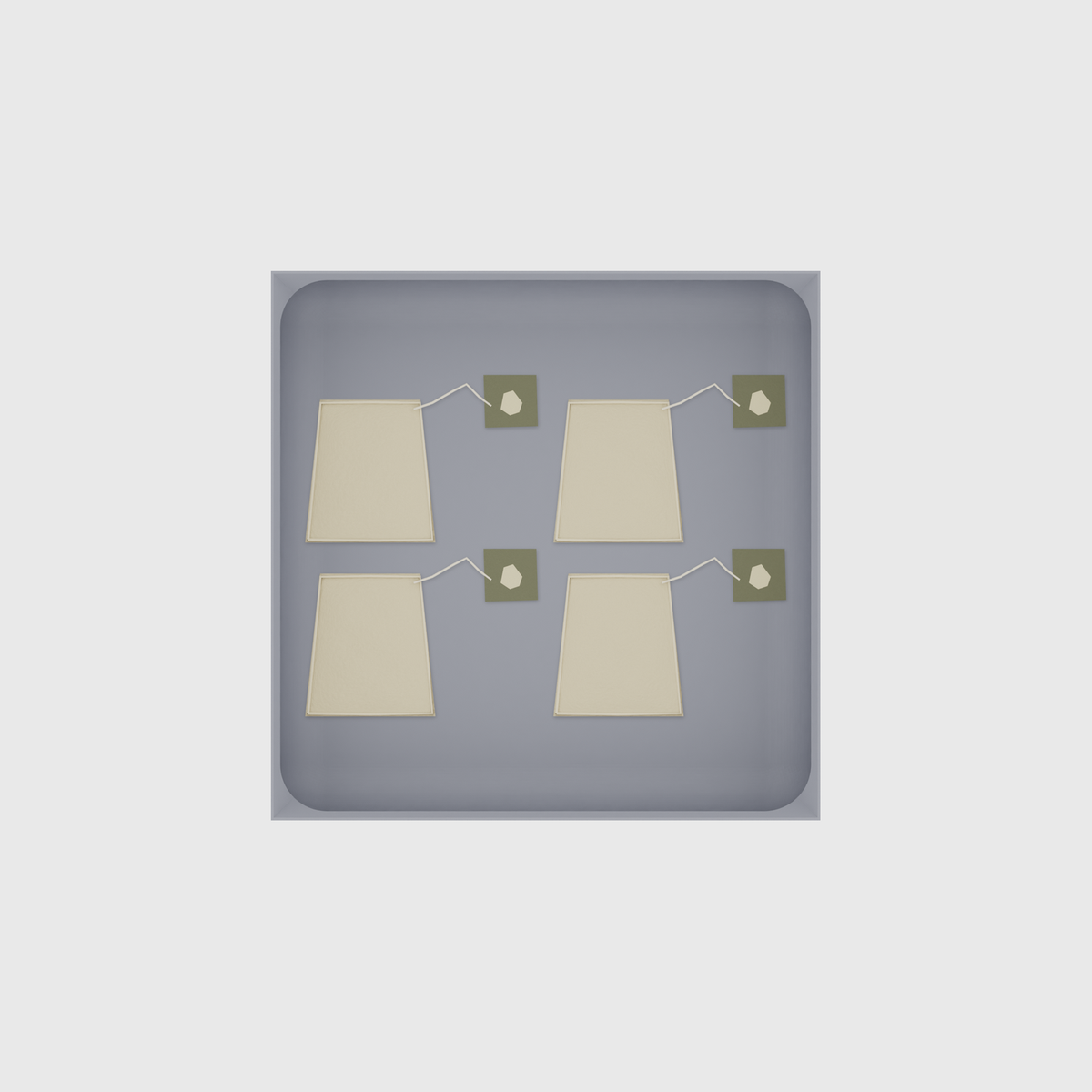 Large tray organiser – 6×6 (177 × 177 mm) in Fossil Grey, shown with tea bags. Top view.