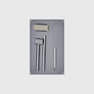 Large tray organiser – 8×5 (236 × 147.5 mm) in Fossil Grey, shown with a garlic press, whisk and other kitchen tools. Top view.