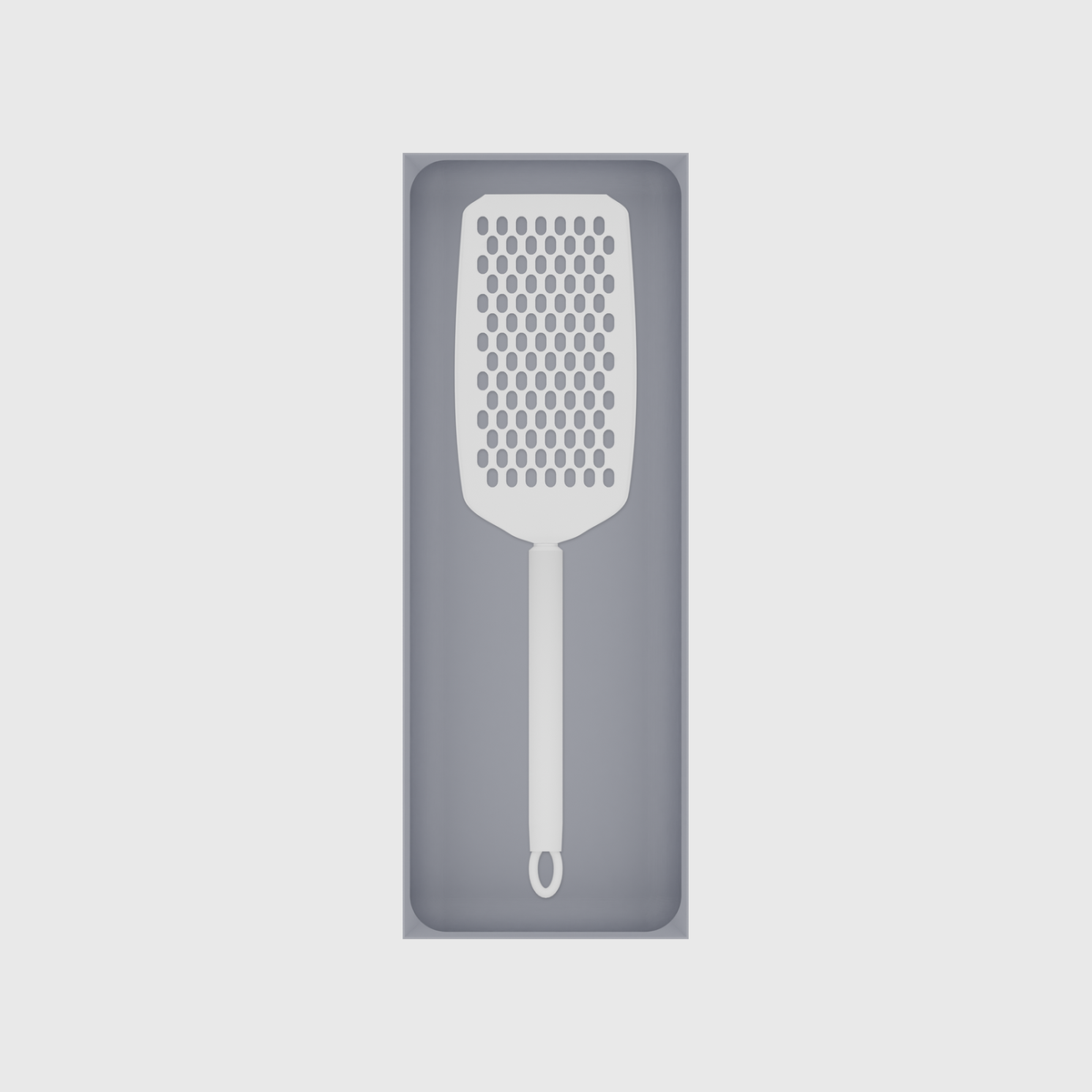 Long tray organiser – 11×4 (324.5 × 118 mm) in Fossil Grey, shown with a handheld grater. Top view.