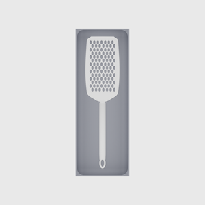 Long tray organiser – 11×4 (324.5 × 118 mm) in Fossil Grey, shown with a handheld grater. Top view.