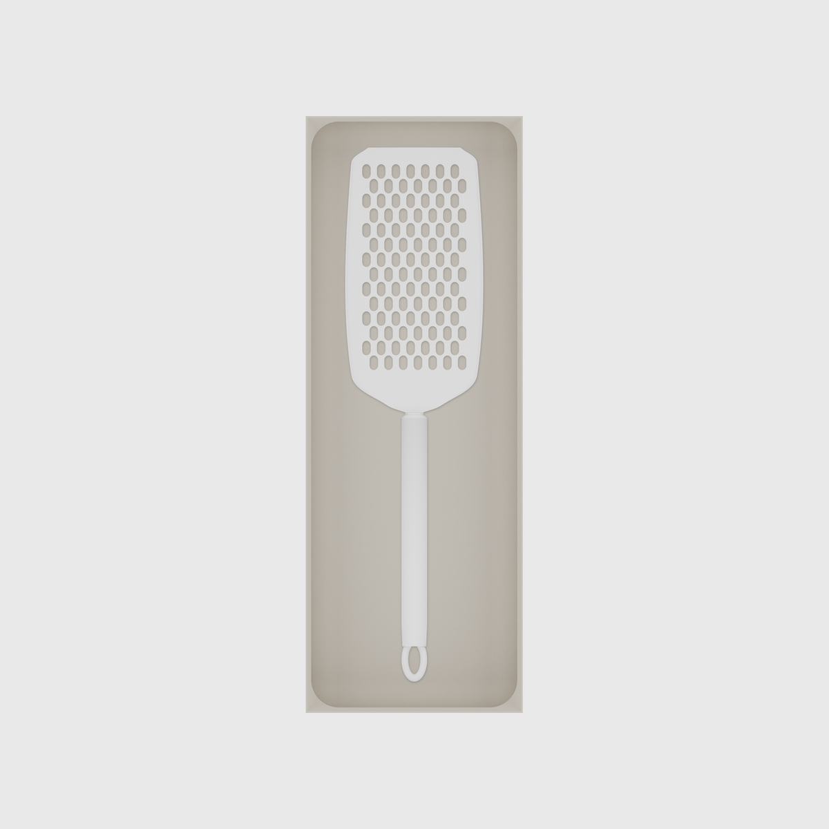 Long tray organiser – 11×4 (324.5 × 118 mm) in Muted White, shown with a handheld grater. Top view.