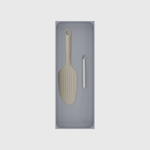 Long tray organiser – 11×4 (324.5 × 118 mm) in Fossil Grey, shown with a whisk and bench scraper. Top view.