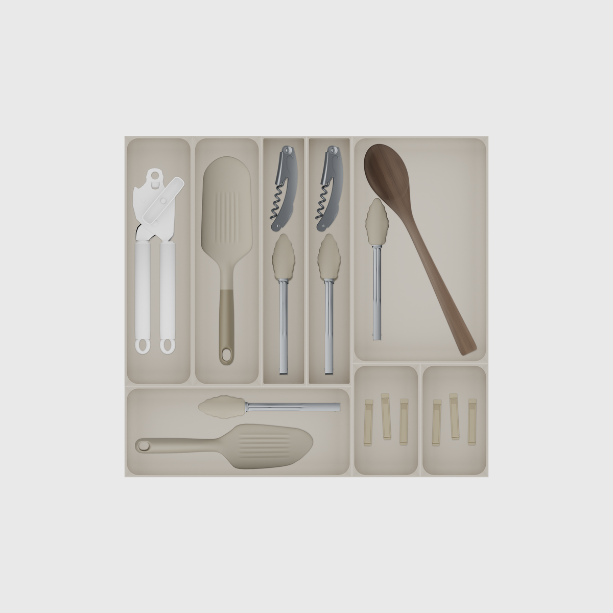 Maximiser Kitchen Tool Drawer Organiser Set – 442.5 × 472 mm in Muted White, shown with a can opener, a slim spatula, a corkscrew and kitchen tongs and other small items. Top view.