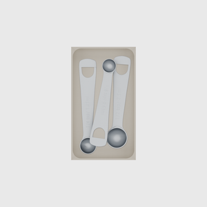 Medium tray organiser – 7×4 (206.5 × 118 mm) in Muted White, shown with 3 measuring spoons. Top view.
