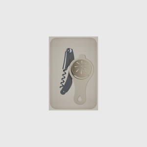 Medium tray organiser – 6×4 (177 × 118 mm) in Muted White, shown with a corkscrew and egg separator. Top view.