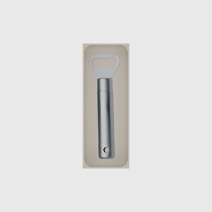 Medium tray organiser – 8×3 (236 × 88.5 mm) in Muted White, shown with a bottle opener. Top view.