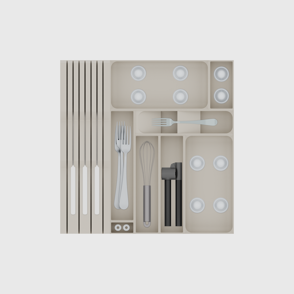 Primary Cutlery Drawer with Medium Kitchen Tool Storage in Muted White, shown with 3 kitchen knives, coffee capsules, 3 dinner forks and other small items. Top view.