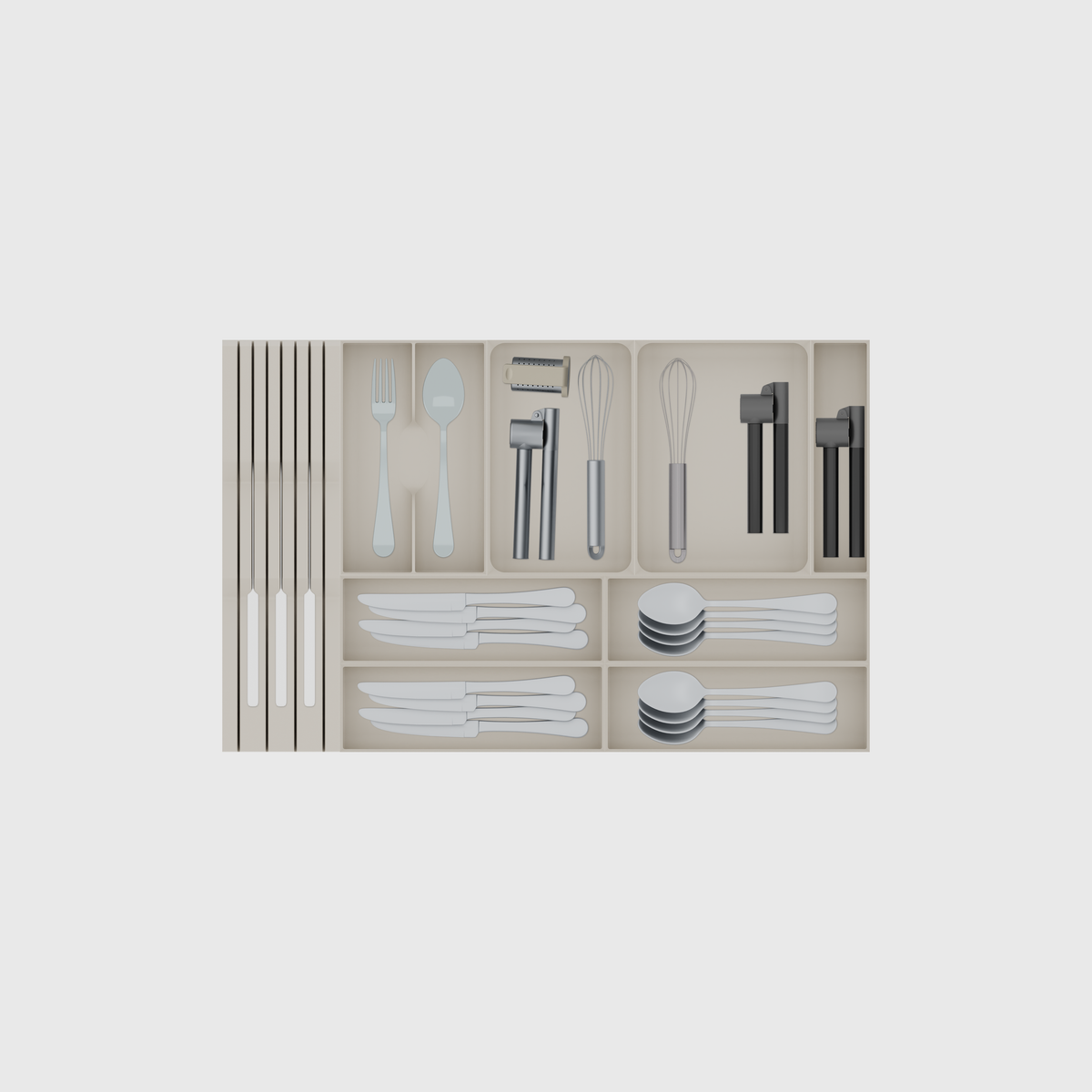 Wide Cutlery & Knife Drawer Organiser Set – 649 × 413 mm in Muted White, shown with 3 kitchen knives, a dinner fork and a soup spoon, a garlic press, whisk and other kitchen tools and other small items. Top view.