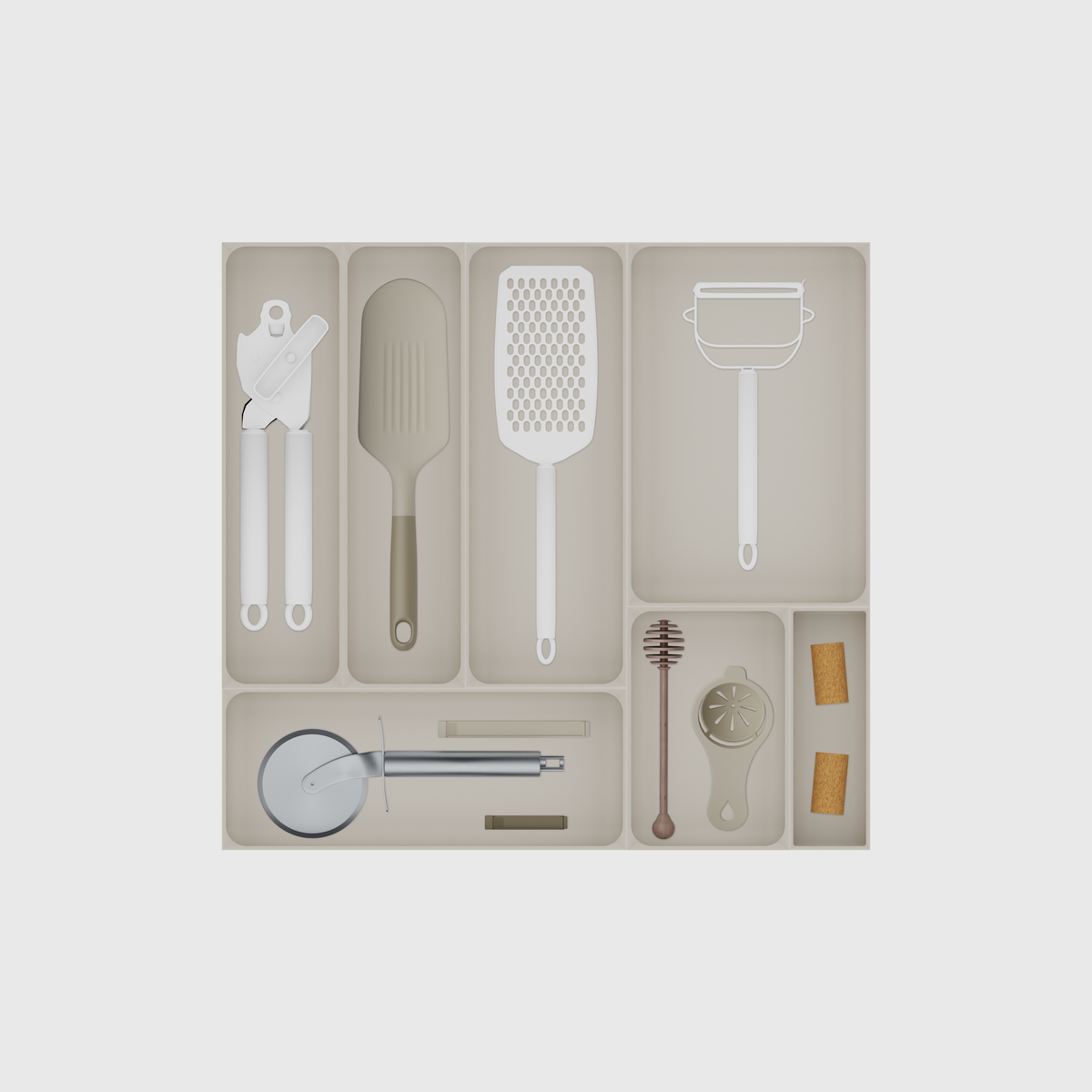 Wide Kitchen Tool Drawer Organiser Set – 442.5 × 472 mm in Muted White, shown with a can opener, a slim spatula, a handheld grater and other small items. Top view.
